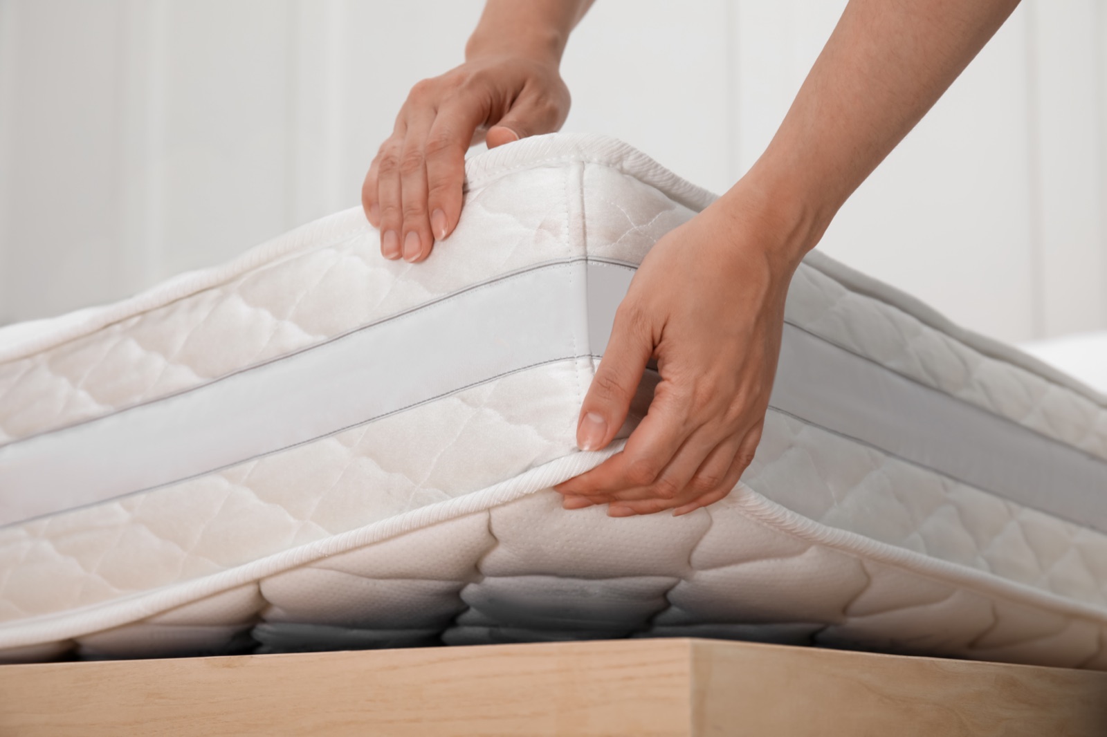Adjusting a mattress on a bed